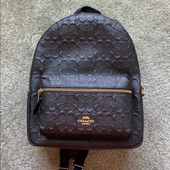 coach embossed backpack